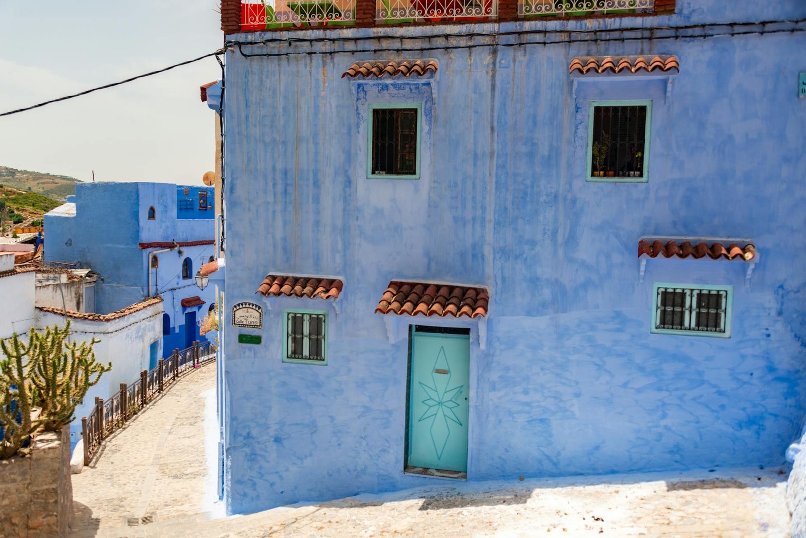 Explore the vibrant blue architecture of Chefchaouen, Morocco, a stunning travel destination.